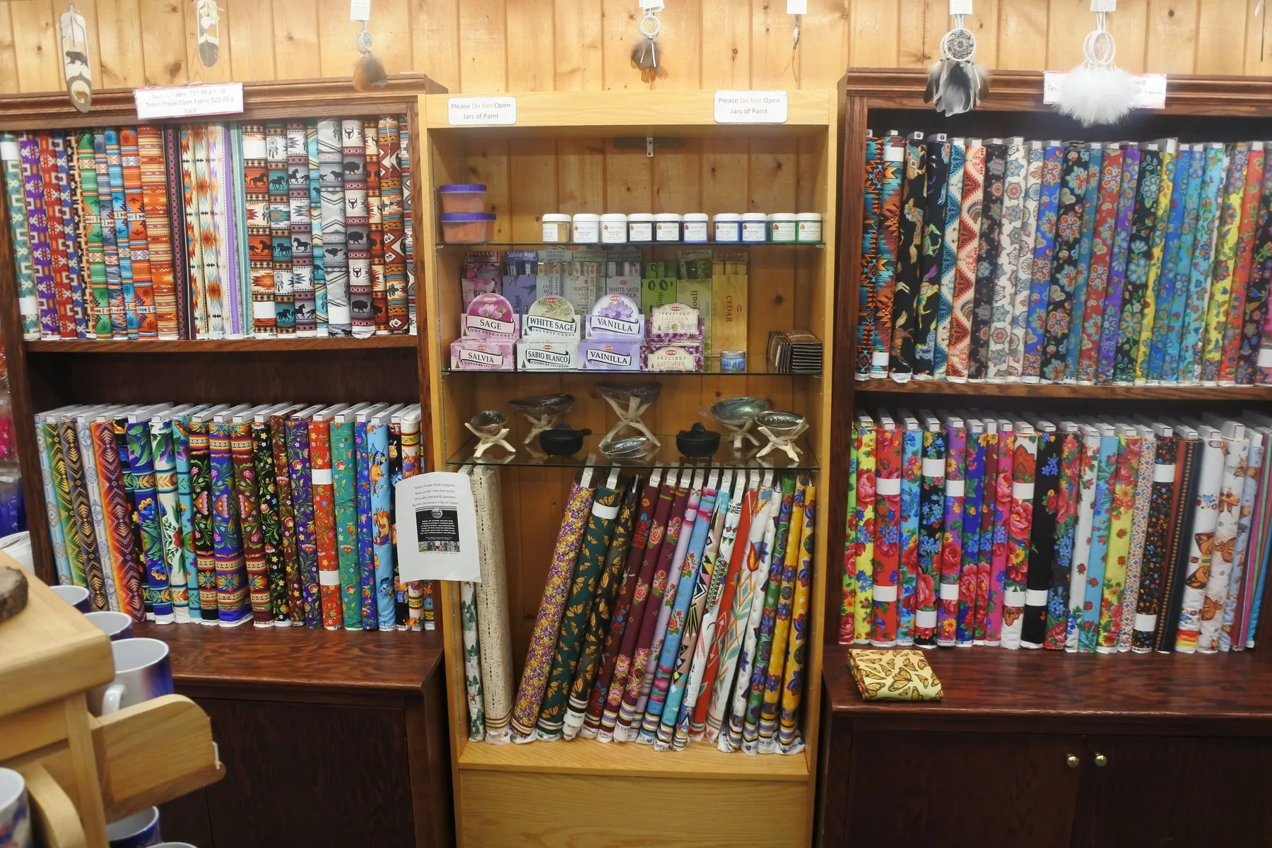 Fabric by the yard and craft supplies inside Wind River Trading Company