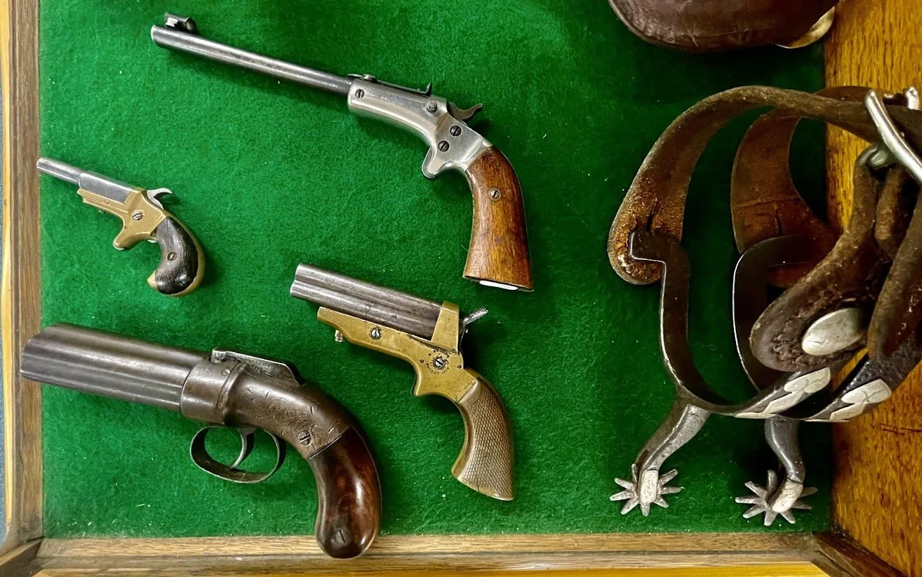 Historic firearms displayed inside the Gallery of the Wind